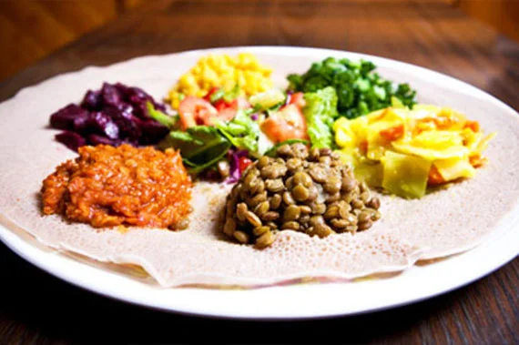Vegan Ethiopian combo plate on injera at Enat Restaurant in downtown London, Ontario
