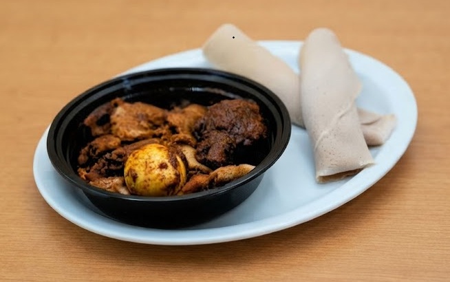 Fitfit-style injera and wot platter at Enat Ethiopian Restaurant London